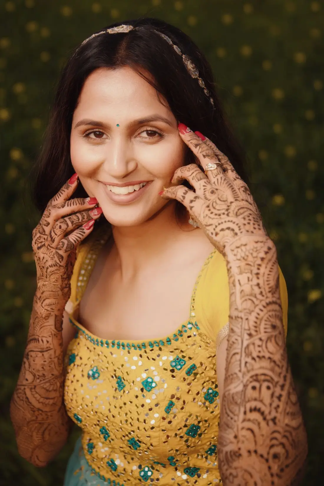Bridal hands with intricate mehndi designs